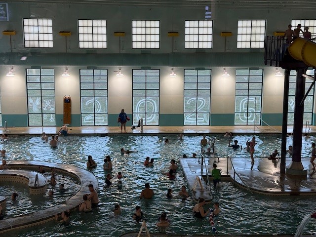 indoor pool with swimmers